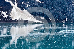 Brash ice and reflection in Glacier Bay National Park, Alaska