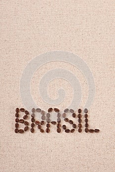 Brasil written with coffee beans on canvas