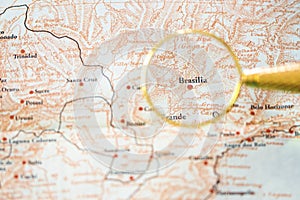 Brasilia Brasil, on an ancient map of south america. Travel agency advertising background