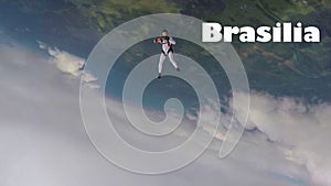 Brasilia. Skydiver from Brasilia performs a trick in the sky. Free fall.