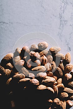 Brasilian nuts and almonds on a pile. Healthy snacks. photo