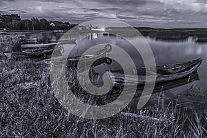 Braslav Lakes in Belarus. Two Boats Floating on Water in The Eve