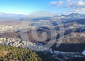 Brasov City district and Bucegi Mountains , Romania, aerial view