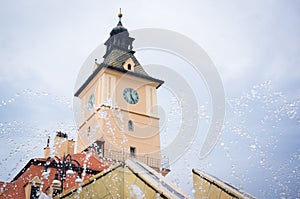 Brasov clock tower with water droplets from the fo