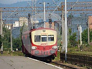 BRASOV - JUNE 24: Caravelle autorail entering Brasov railway station. Photo taken on June 24 in Brasov, Romania