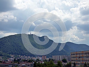 BRASOV - JUNE 5, 2017: Sign with the name of the city of Brasov on mount Tampa.