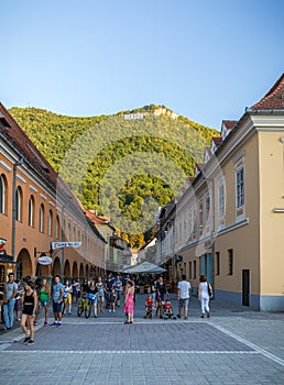 Brasov, Romania - 10 August, 2017: The Brasov Council Square (Piata Sfatului), is the main central square of the old medieval cit