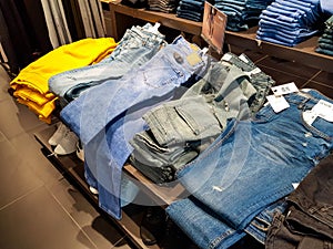 Jeans in different color and size at the local mall.