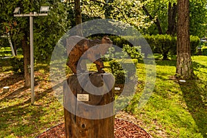 BRASOV, ROMANIA. Wood statue in front of the Faculty of Silviculture and Forest Engineering.
