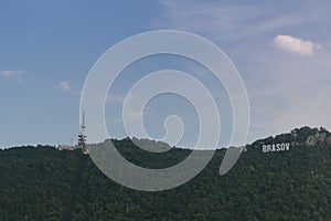 Brasov sign and comunication tower photo