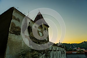 Brasov, Transylvania. Romania: The beautiful landscape of the city in the evening. Panorama of the old town at sunset