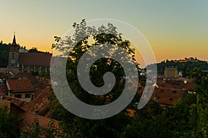 Brasov, Transylvania. Romania: The beautiful landscape of the city in the evening. Panorama of the old town at sunset