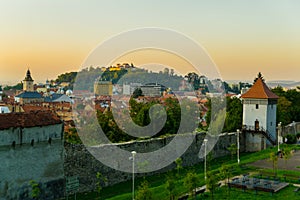 Brasov, Transylvania. Romania: The beautiful landscape of the city in the evening. Panorama of the old town at sunset