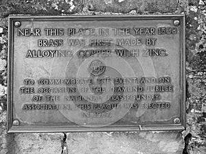 Brass alloy plaque in Tintern, black and white photo