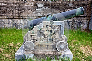 Brass Cannon on Stone Cradle