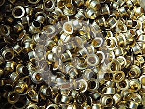 Brass circular vintage eyelets used in fashion and leather work