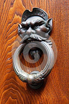 Brass door knocker with a Male figure