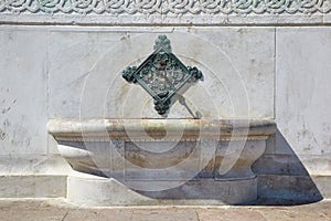 The brass fountain spouts over basins on the side of German Fountain, Istanbul