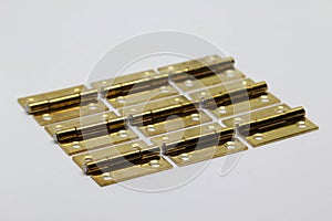 Brass hinge on white background