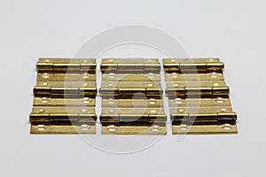 Brass hinge on white background