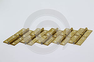 Brass hinge on white background