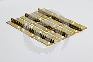 Brass hinge on white background