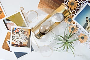 Brass Hourglass with polaroids and air plant