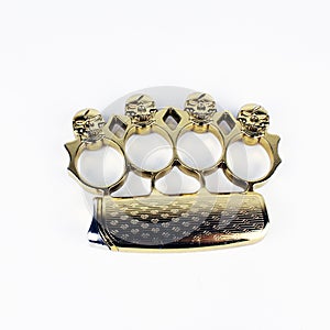 Brass knuckle duster, weapon for hand, isolated on white. Design, gangster