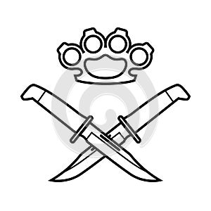 Brass knuckles and crossed knives. Flat black image, icon, isolated background.