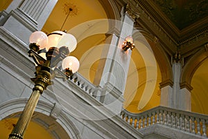 Brass lamppost and arches