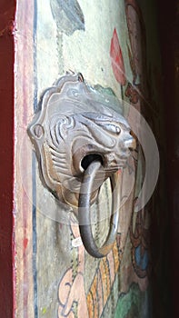 Brass Lion door knock on temple door