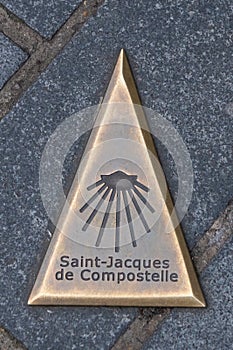 Brass marker on the road, the way of St. James