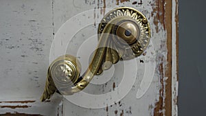 brass ornate door handle, in the cathedral, Helsinki, Finland