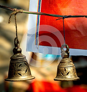 Brass praying bells hanging