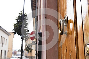 Brass ring knocker on old wooden door