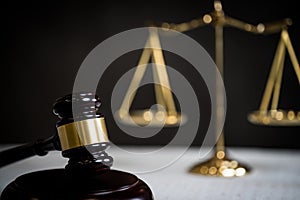 Brass scale of justice. Judge`s mallet. The criminal law.