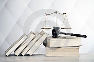 Brass scale of justice. Judge`s mallet. The criminal law.