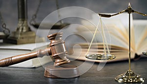 Brass scale of justice. Judge`s mallet. The criminal law.