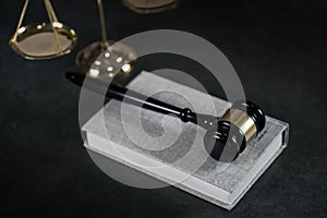 Brass scale of justice. Judge`s mallet. The criminal law.