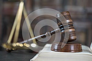 Brass scale of justice. Judge`s mallet. The criminal law.