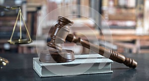 Brass scale of justice. Judge`s mallet. The criminal law.