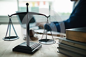 Brass scales are placed on lawyers desks in legal advice offices as a symbol of fairness and integrity in the High Court decision