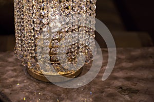 Brass sconces with crystal.