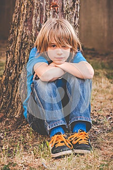 Brat little boy - sadness photo