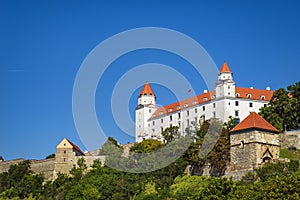 Bratislava castle against a blue sky.Castle Bratislava. White Castle in Bratislava