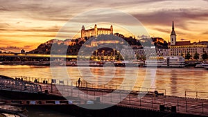 Bratislava city on Danube river, Slovakia, on sunset