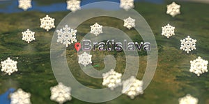 Bratislava city and snowy weather icon on the map, weather forecast related 3D rendering