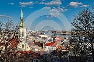 Bratislava cityscape view from the Bratislava Castle. St. Martin`s Cathedral and Apollo Bridge.