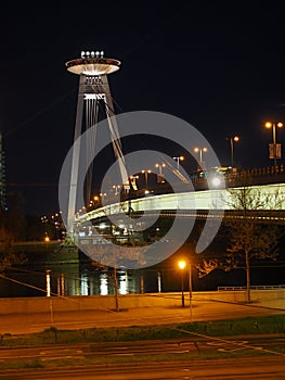 Bratislava-evening view of the Danube river and the bridge and tall houses in the background,Slovakia