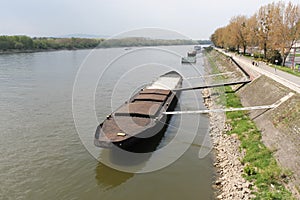 Bratislava, Slovakia - April, 2011: barge near pier on Danube river view from SNP bridge